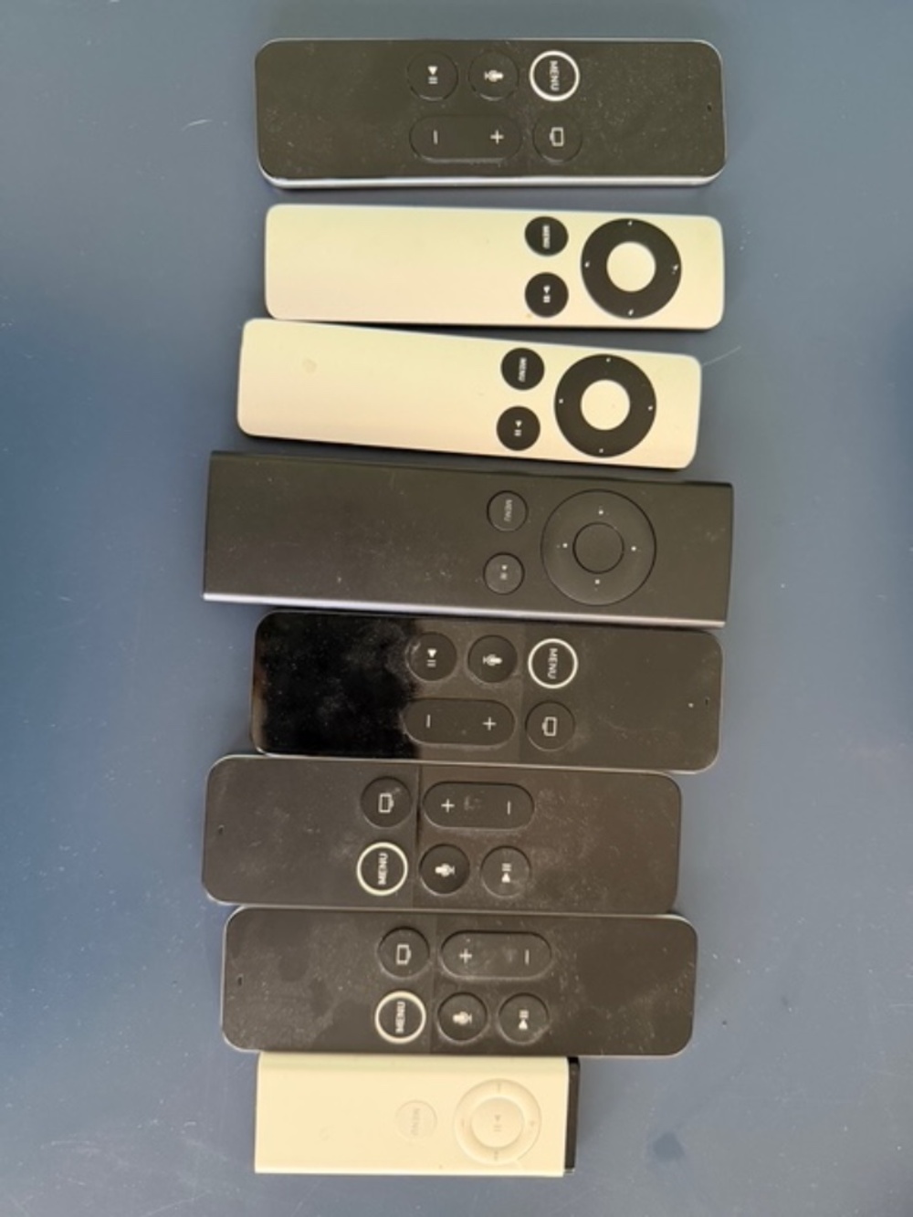 Bundle of Apple TV remotes some with Siri